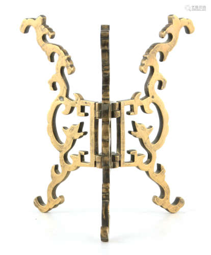 A 19TH CENTURY CHINESE FOLDING BRASS BOWL STAND with shaped ...
