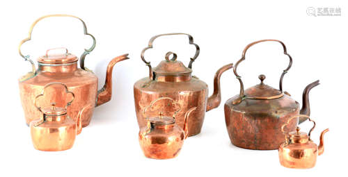 A MATCHED GRADUATED SET OF SIX LATE GEORGIAN COPPER KETTLES ...