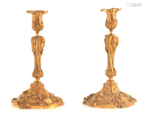 A PAIR OF 18TH CENTURY STYLE FRENCH ROCOCO GILT BRASS CANDLE...