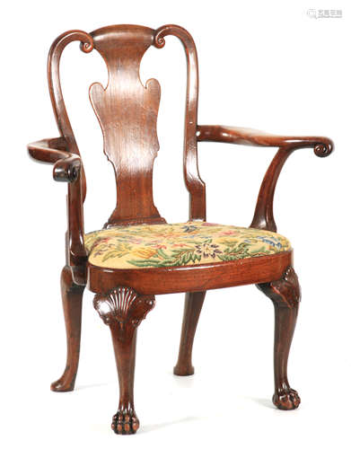 A FINE GEORGE I WALNUT OPEN ARMCHAIR with scrolled vase-shap...