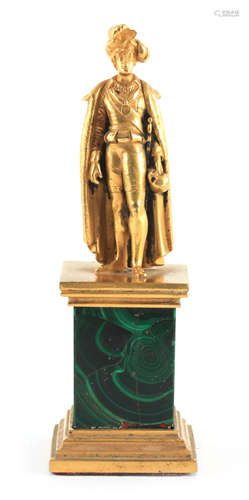 A 19TH CENTURY GILT BRONZE AND MALACHITE SCULPTURE OF SHAKES...