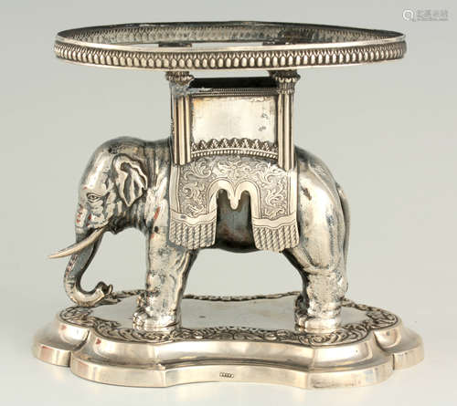 A 19TH CENTURY EUROPEAN SILVER CENTREPIECE STAND depicting a...