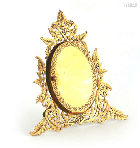 A 19TH CENTURY FRENCH GILT BRASS ENGRAVED PHOTO FRAME HOLDER...