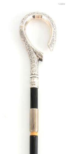 A LATE 19TH CENTURY SILVER TOPPED SWORD STICK with chased sh...