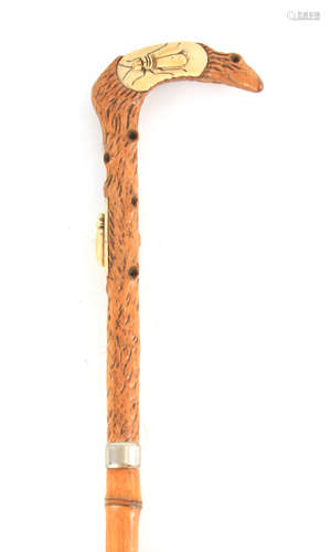 A LATE 19TH CENTURY JAPANESE WALKING STICK with naturalistic...