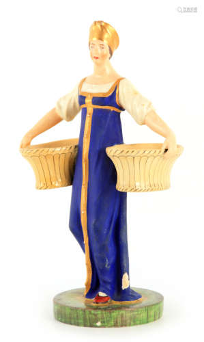A RUSSIAN PORCELAIN FIGURE depicting a young female carrying...