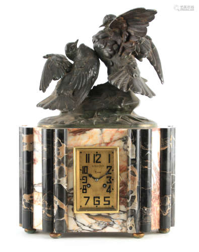 A LARGE ART DECO BRONZED AND MARBLE MANTEL CLOCK the case su...