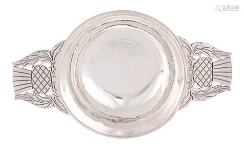 A GEORGE VI LARGE SILVER QUAICH with bright cut pierced this...