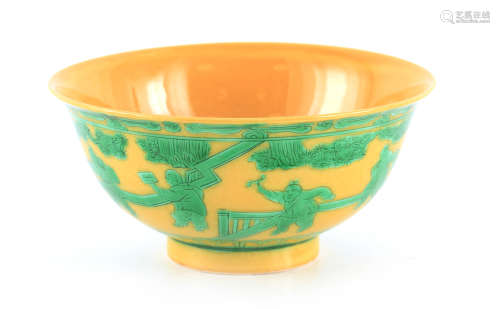 A CHINESE YELLOW GROUND FOOTED BOWL with raised green overgl...