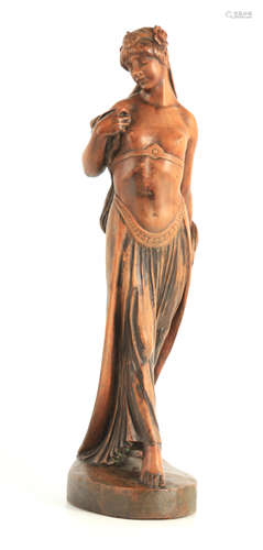 A LARGE AND FINELY CARVED ART NOUVEAU FRUITWOOD SCULPTURE SI...