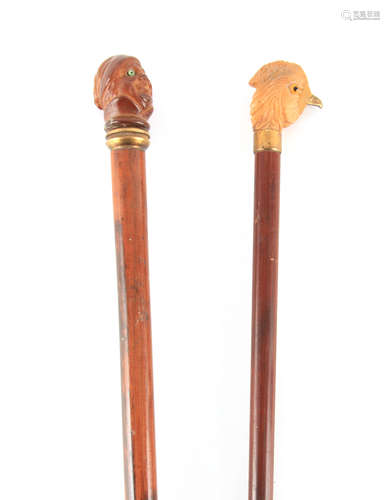 TWO 19TH CENTURY FRENCH WALKING STICKS one with a carved box...