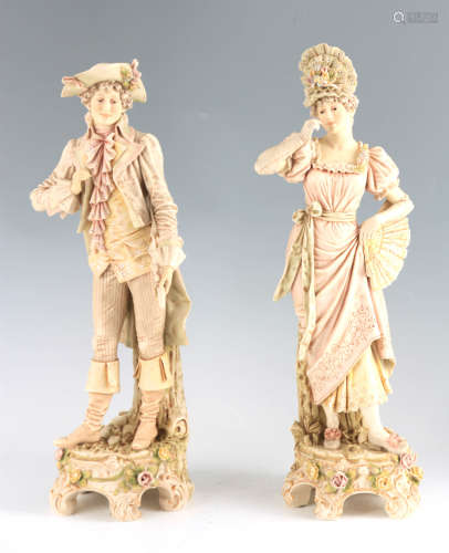 A PAIR OF LATE 19TH CENTURY ROYAL DUX FIGURES of a Lady and ...