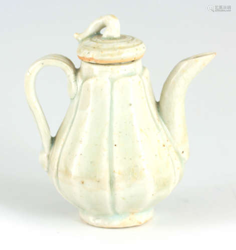 AN EARLY ANTIQUE CHINESE CELEDON MINATURE TEAPOT decorated w...