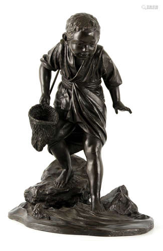 A MEIJI PERIOD JAPANESE BRONZE OKIMONO depicting a fisher bo...