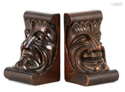 A PAIR OF LATE 19TH CENTURY CARVED OAK BOOKENDS modelled as ...