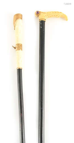 TWO LATE 19TH CENTURY FRENCH IVORY MOUNTED AND EBONISED WALK...