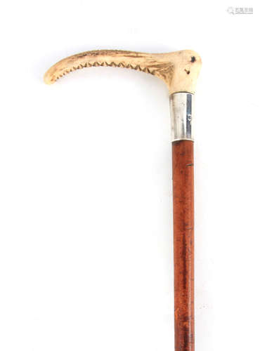 A 19TH CENTURY RIDING CROP BY BRIGG with antler horn handle ...