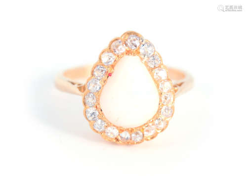 A LADIES 18CT YELLOW GOLD OPAL AND DIAMOND RING having a pea...