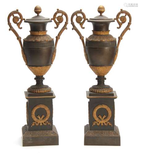 A PAIR OF REGENCY BRONZE AND ORMOLU ADAM STYLE URNS/CANDLEHO...