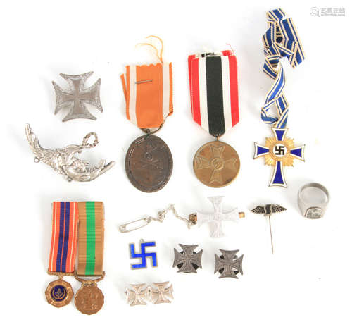 A COLLECTION OF GERMAN NAZI MEDALS together with various bad...