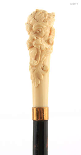 A LATE 19TH CENTURY IVORY CARVED HEAD WALKING STICK DEPICTIN...