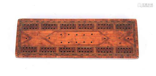 A 19TH CENTURY SATINWOOD AND INLAID CRIBBAGE BOARD 28cm wide...