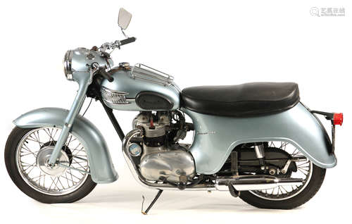 A 1957 TRIUMPH T21 MOTORCYCLE in pale blue, the 350cc bike h...