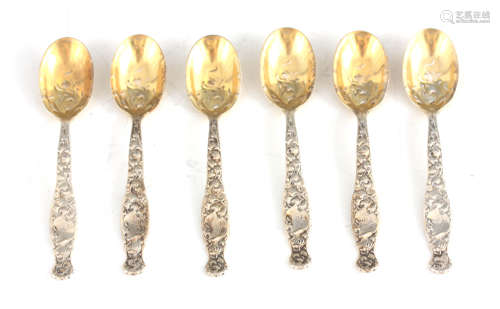 A SET OF SIX SILVER COFFEE SPOONS decorated with Rocco desig...
