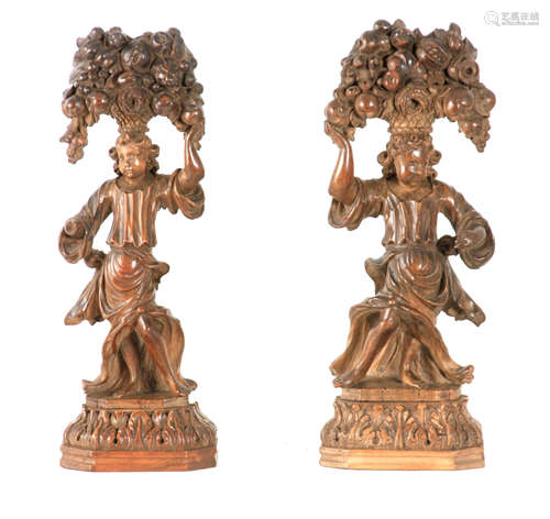 A PAIR OF LATE 16TH CENTURY LIME WOOD CARVINGS depicting fig...