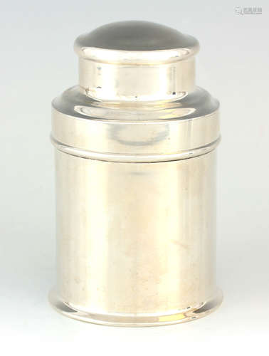 A PLAIN SILVER CYLINDRICAL TOBACCO CANISTER with domed top l...