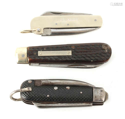 A COLLECTION OF THREE FOLDING KNIVES - a military knife with...