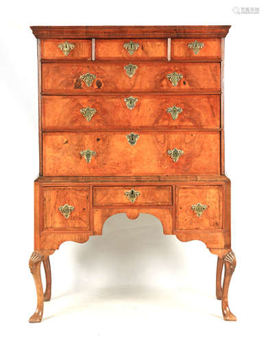 A QUEEN ANNE HERRING-BANDED FIGURED WALNUT CHEST ON STAND wi...