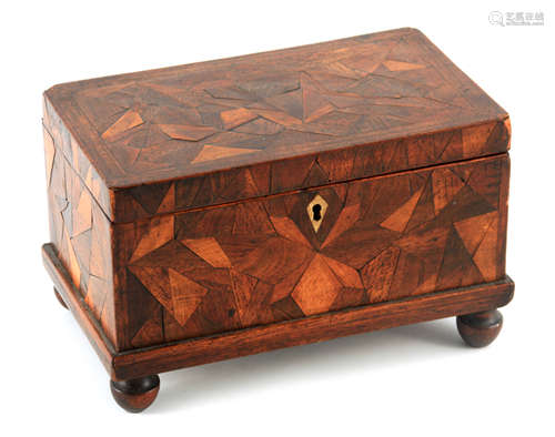 A GEORGIAN EXOTIC WOOD RANDOM PARQUETRY INLAID BOX on turned...