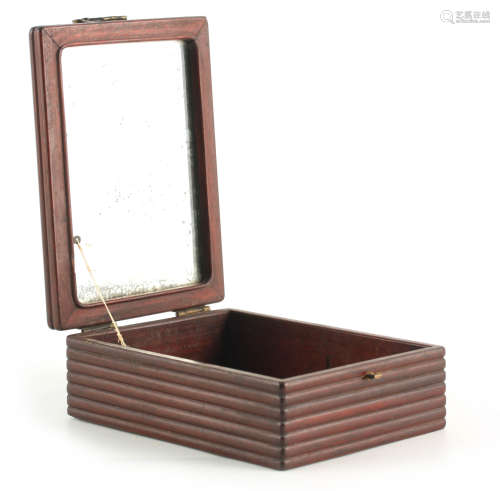 A CHINESE HARDWOOD DRESSING TABLE BOX with hinged mirrored l...