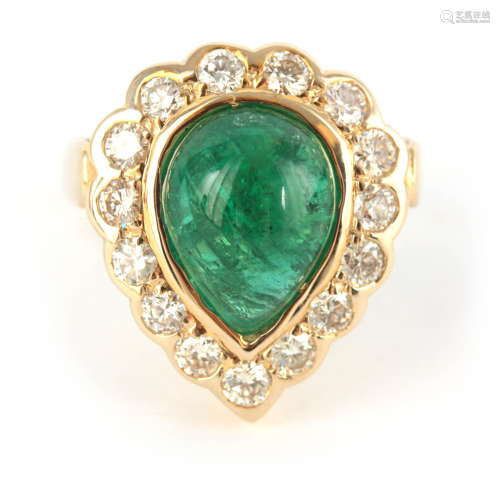 A LADIES 9CT YELLOW GOLD EMERALD AND DIAMOND RING having a l...