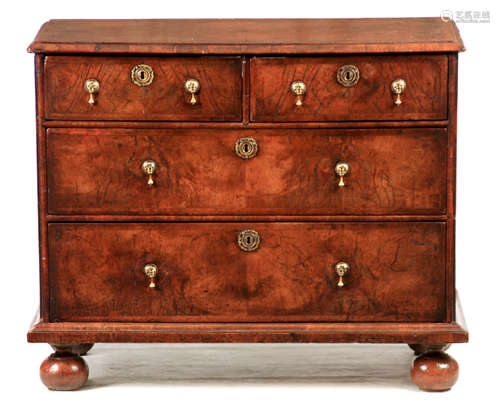 A WILLIAM AND MARY FIGURED WALNUT AND HERRING-BANDED CHEST O...