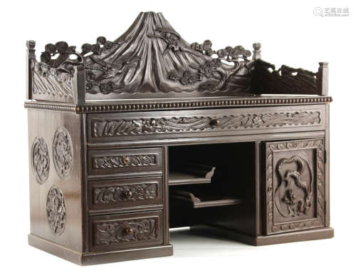 A 20TH CENTURY JAPANESE CARVED WOOD TABLE TOP CABINET with g...