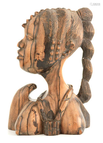 AN AFRICAN CARVED ROSEWOOD BUST OF A YOUNG AFRICAN FEMALE 29...