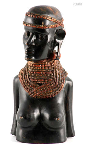 A 20TH CENTURY AFRICAN CARVED HARDWOOD BUST of a tribal lady...