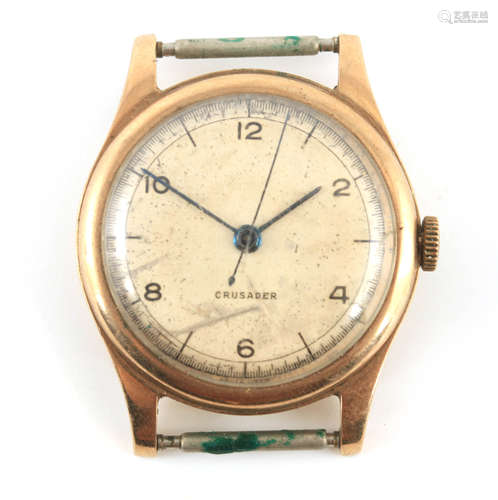 A GENTLEMAN'S VINTAGE 9CT GOLD CRUSADER WRIST WATCH having a...