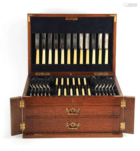 A VICTORIAN CANTEEN OF SILVER CUTLERY FOR TWELVE TABLE SETTI...