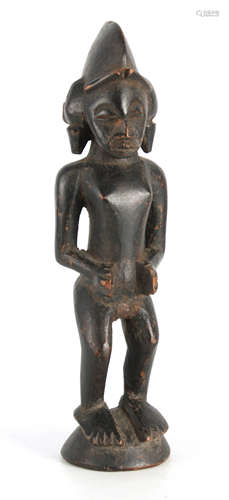 AN 19TH CENTURY AFRICAN CARVED TRIBAL STANDING FIGURE 30.5cm...