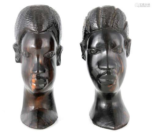 TWO CARVED EBONY AFRICAN BUSTS 13cm high