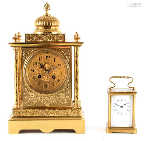 A LATE 19TH CENTURY FRENCH BRASS CASED MANTEL CLOCK having a...