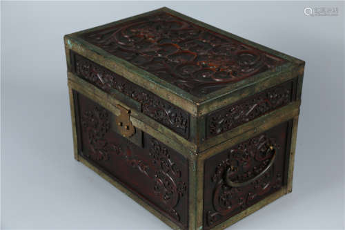 A HUANGHUALI WOOD CARVED TEA CHEST