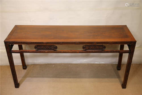 A WOOD FLAT-TOPPED TABLE