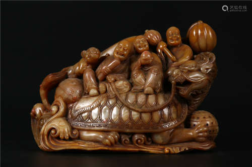 A CARVED ORNAMENT, ARHATS RIDING DRAGON TURTLE