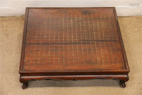 A HUANGHUALI WOOD CHESSBOARD TABLE