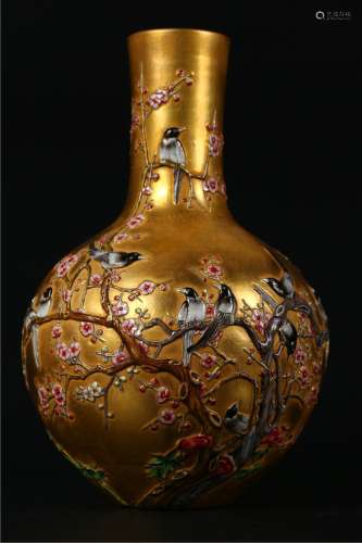 A GOLD DEPICTED CELESTIAL SPHERE SHAPED BOTTLE