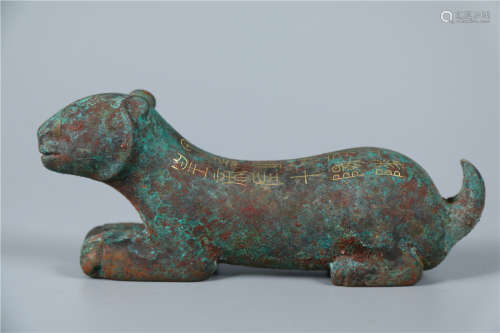 A BRONZE TIGER-SHAPED TALLY